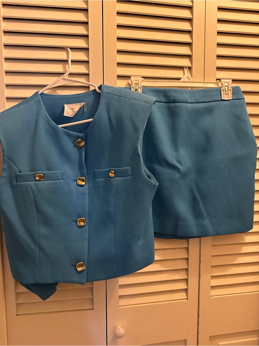 Blue Women's Two-Piece Skirt Set with Gold Buttons
